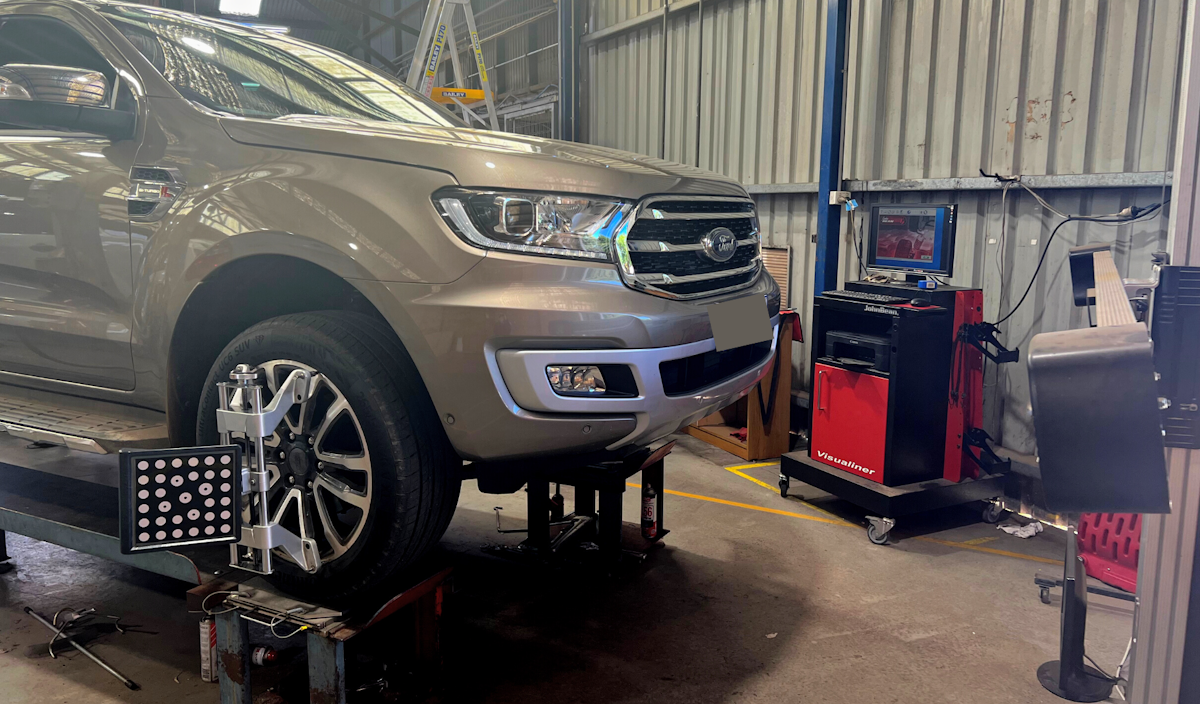 a vehicle undergoing as wheel alignment at Paul Tidyman Automotives